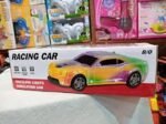 Buy this colorful Racing Car Toy with flashing lights and realistic design. Battery operated simulation car perfect for kids’ indoor fun and play. - Image 2